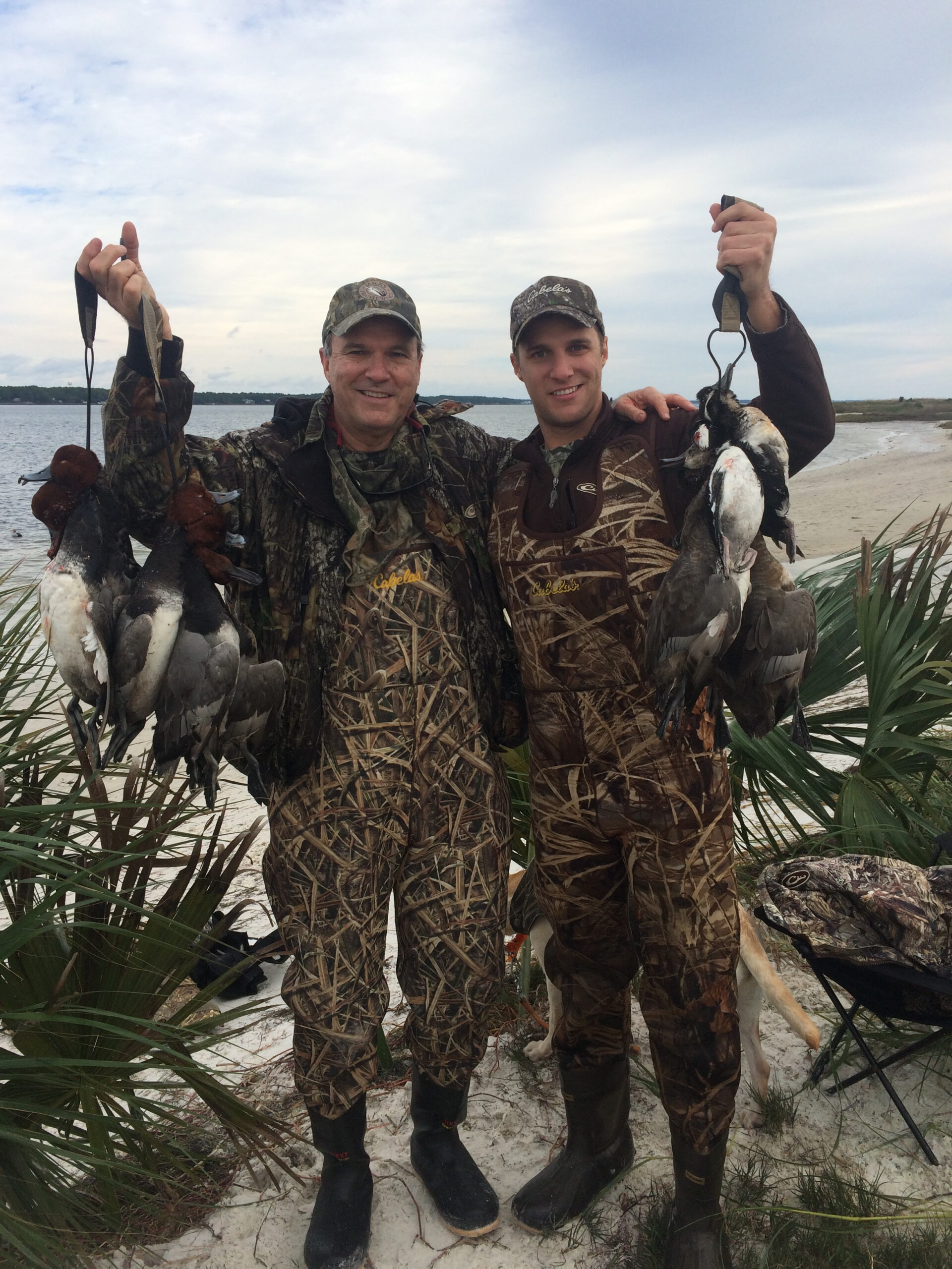 Hunters with straps of redheads and bluebills on Florida's Forgotten Coast